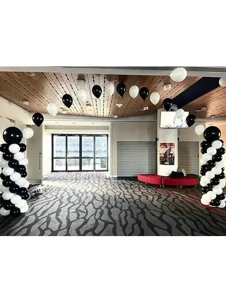 Balloon arch with string balloons
